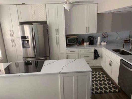 White Shaker Cabinets and Quartz Countertops Installed