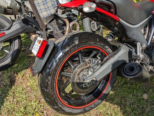 Rear wheel covered with oil during ride