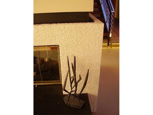 Crema Marfil marble fireplace surround with a Raked finish.