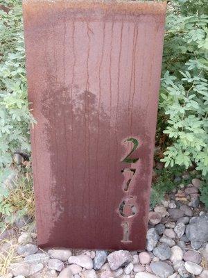 Rusted steel address sign