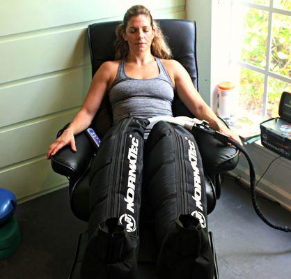 Normatec Recovery Boots. Aids in decreasing joint swelling, reduce lactic acid buildup & increase circulation while you lay back & relax.