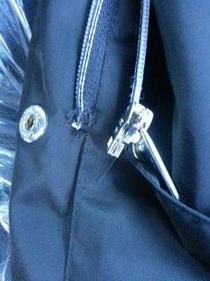 Damaged jacket zipper.