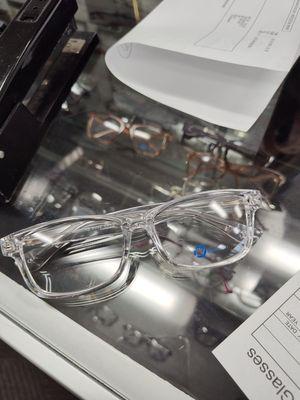 A picture of a clear glasses frame.