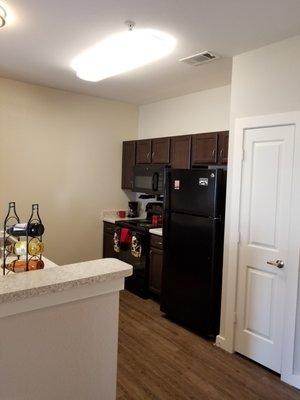 Kitchen complete with Energy Star rated appliances to include built in microwave, stove, refrigerator with ice maker, disposal & dishwasher.