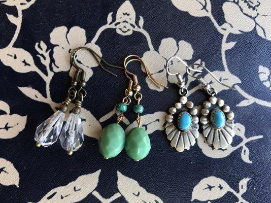 Handmade earrings, including a pair made from recycled necklace beads.