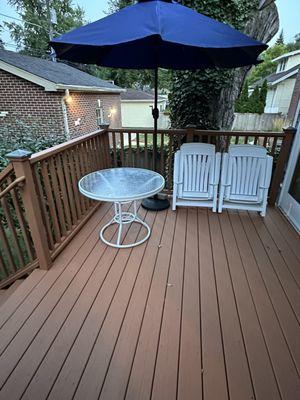 My stained deck by Crescent Avenue Painting.