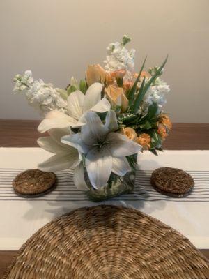 Beautiful floral arrangement in square vase