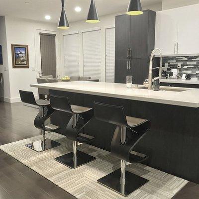 Modern Contemporary Kitchen Island with Quartz Galaxy Counters featuring FLOR Square Tiles.