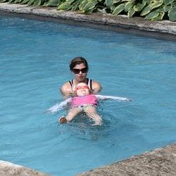 Instructor Bree teaching her student how to swim