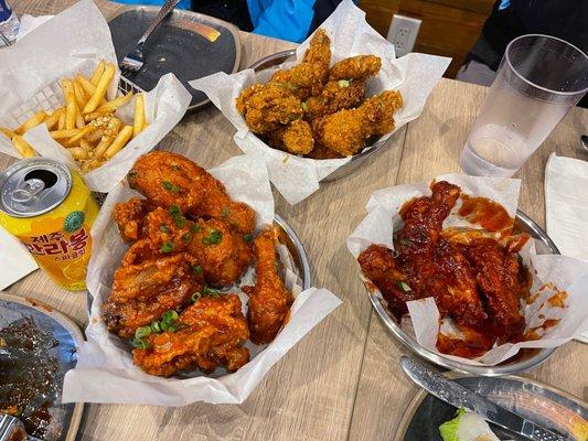 Half order each of Sweet Garlic, Gochugang Rose, Yang Nyum (sweet and spicy) and Garlic Fries + Korean citrus soda.