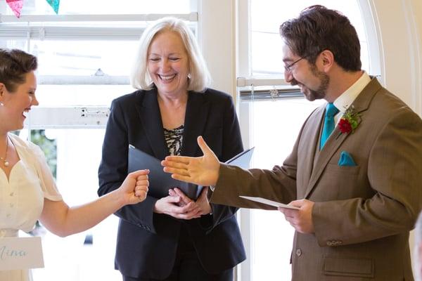 Minister Maggie Officiating our Marriage in Sept 2014! Who's doing their reading first? Rock - paper - scissors!