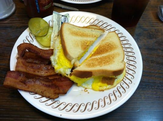 Great cheese & egg sandwich with some crispy bacon on the side!