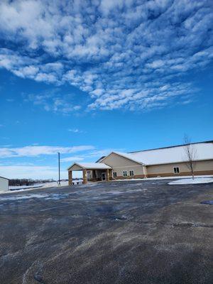 The outside of The Woodlands Senior Activity Center on a sunny day