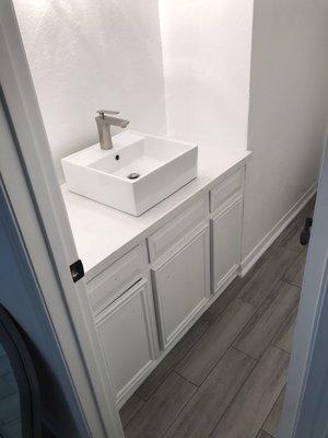 Quartz countertop and vessel sink