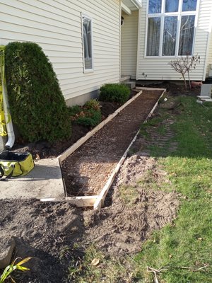 Removal of old concrete sidewalk pads