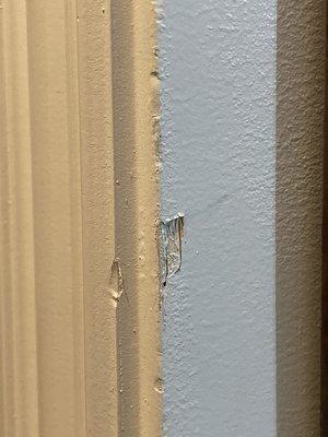 Door frame damage from delivery cart