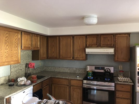 Painting and fixing wooden kitchen.