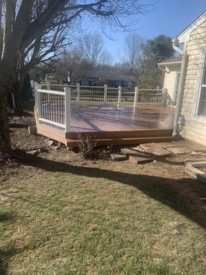 Custom deck remodel maintenance free material.