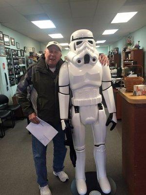 Julie's dad with our office stormtrooper.