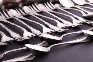 We buy sterling silver flatware stamped with "Sterling" or "925", and flatware with other purities such as "800" or "Coin" stamp.