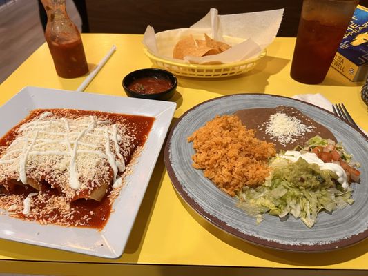 Carne asada enchiladas with red sauce