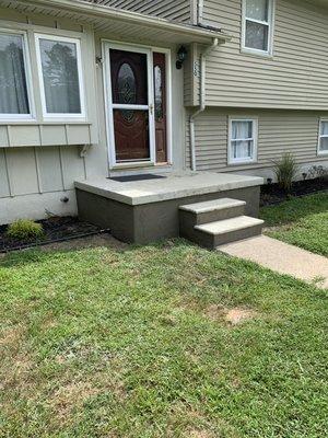 Entire front porch finish stuccoed ready for paint or another coat of colored mud based on the customer's preference