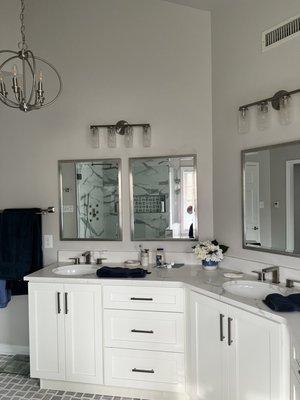 Bathroom totally redone Mirror lights sink vanity