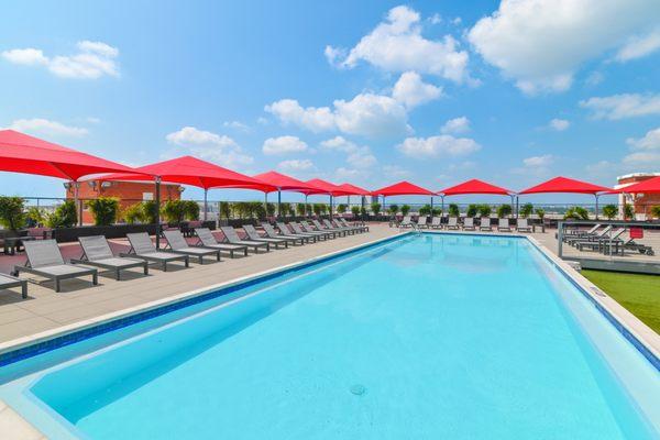 Sky lounge swimming pool located on the top floor of South Side on Lamar with ample seating options