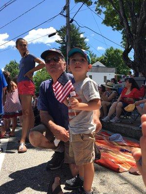 With grandson at 4th July parade.