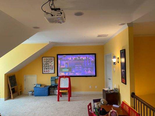 Projector and screen installation with in-ceiling speakers