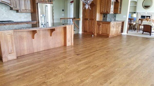 We gave these Red Oak floors a facelift! Stained Bona Provincial and coated with Bona High Traffic HD Satin