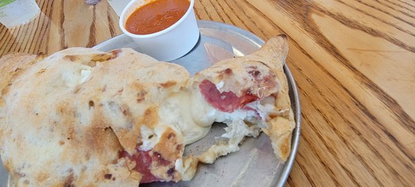 Calzone with Mushrooms & Salami with their yummy sauce!