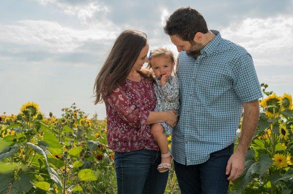 Outdoor family with toddler.