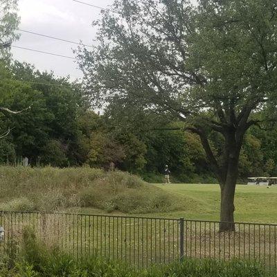 Golfers are constantly peeing at the 11th tee. Even here two golfers are peeing (one just finished,  so 3) at the same time.