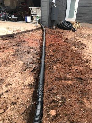 Installation of corrugated drain pipe