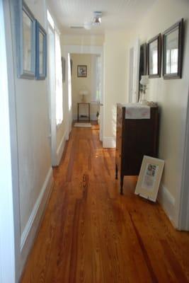 Bedroom hallway with pine floor