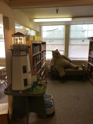 Our kid's room - complete with giant teddy bear and lighthouse dollhouse!