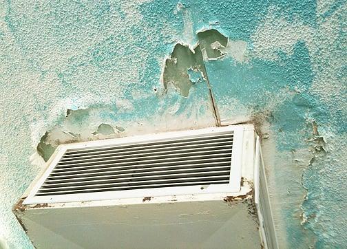 Popcorn ceiling coming down around the main A/C unit.