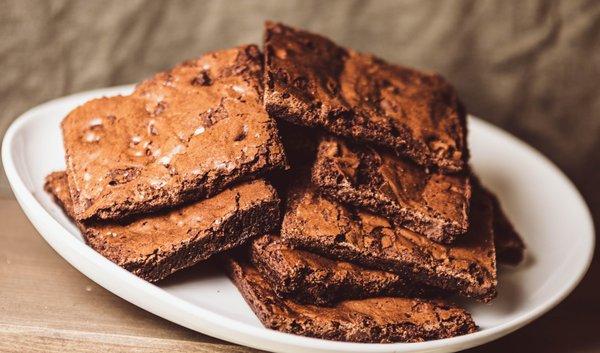 Delcious, chunky fudge brownie made with simple ingredients! Try out our huge selection of made from scratch pastries and baked goods!