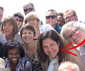 Carole Sargent with faculty from Jesuit colleges and universities, on the roof of the Jesuit Curia in Rome.