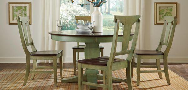 Dining table and chairs from John Thomas Custom Furniture at Daniels' Homeport Coastal Furnishings, OBX Furniture Store.