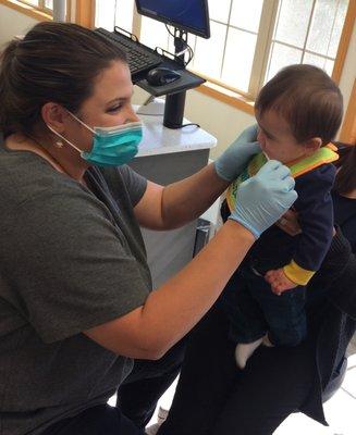 Dr. Gragg with one of our younger patients