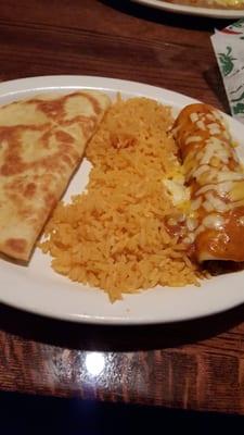 This is one of combinations. Enchilada  and cheese quesedia and of course rice