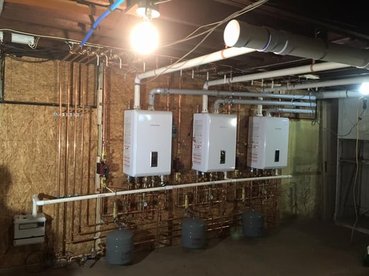 Supplied and installed 3 Navien NCB-210E Condensing Gas Combination boilers 95% efficiency.