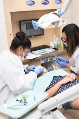 Dr. Williams working with a patient