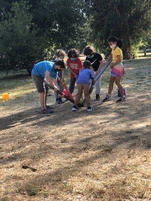 A team building exercise during the kids in the park class.