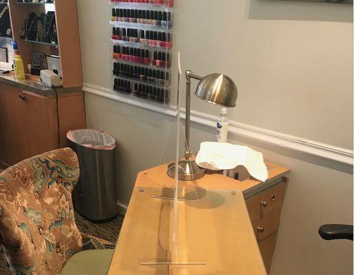 Each nail station is separated with a plexiglass shield. All of our licensed manicurists are required to wear gloves and face masks.