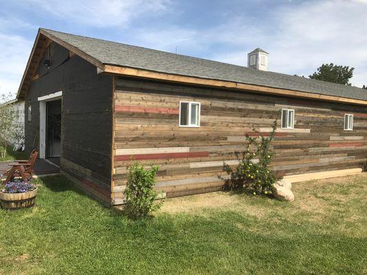 Custom siding installed on barn.