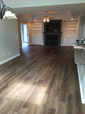 Scrape popcorn ceilings,painted walls, trim cabinets and installed new flooring. Total whole house remodel