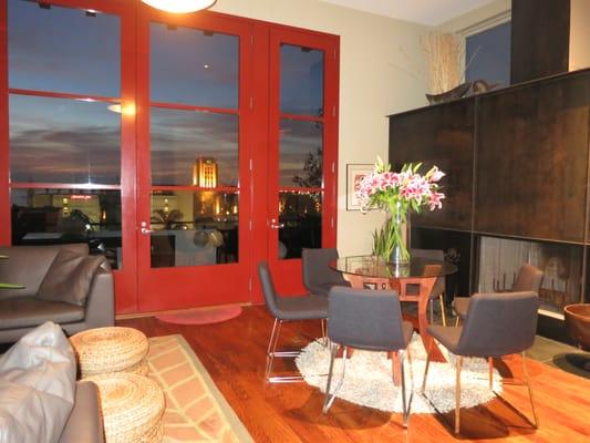 Dining and Living room with fireplace and view of San Diego Bay